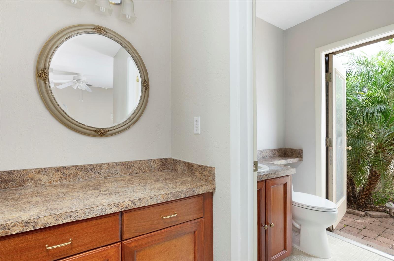 Primary bedroom nook and bathroom