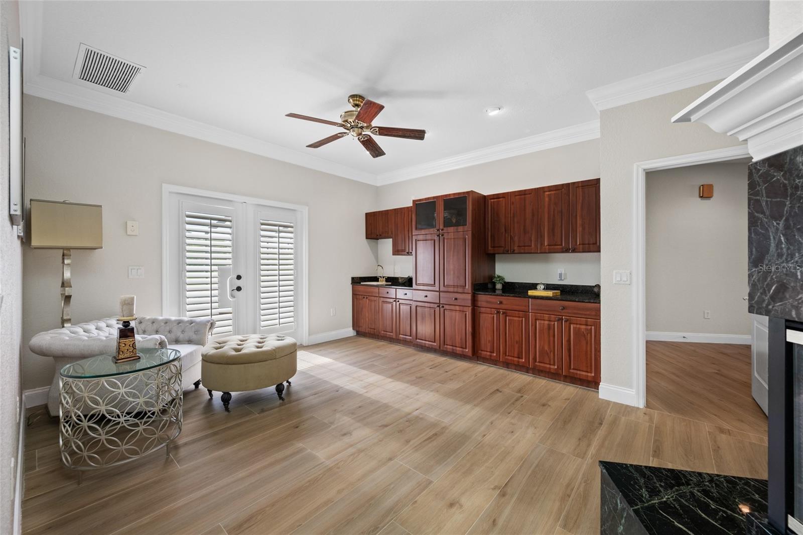 Primary bedroom sitting area- access to pool