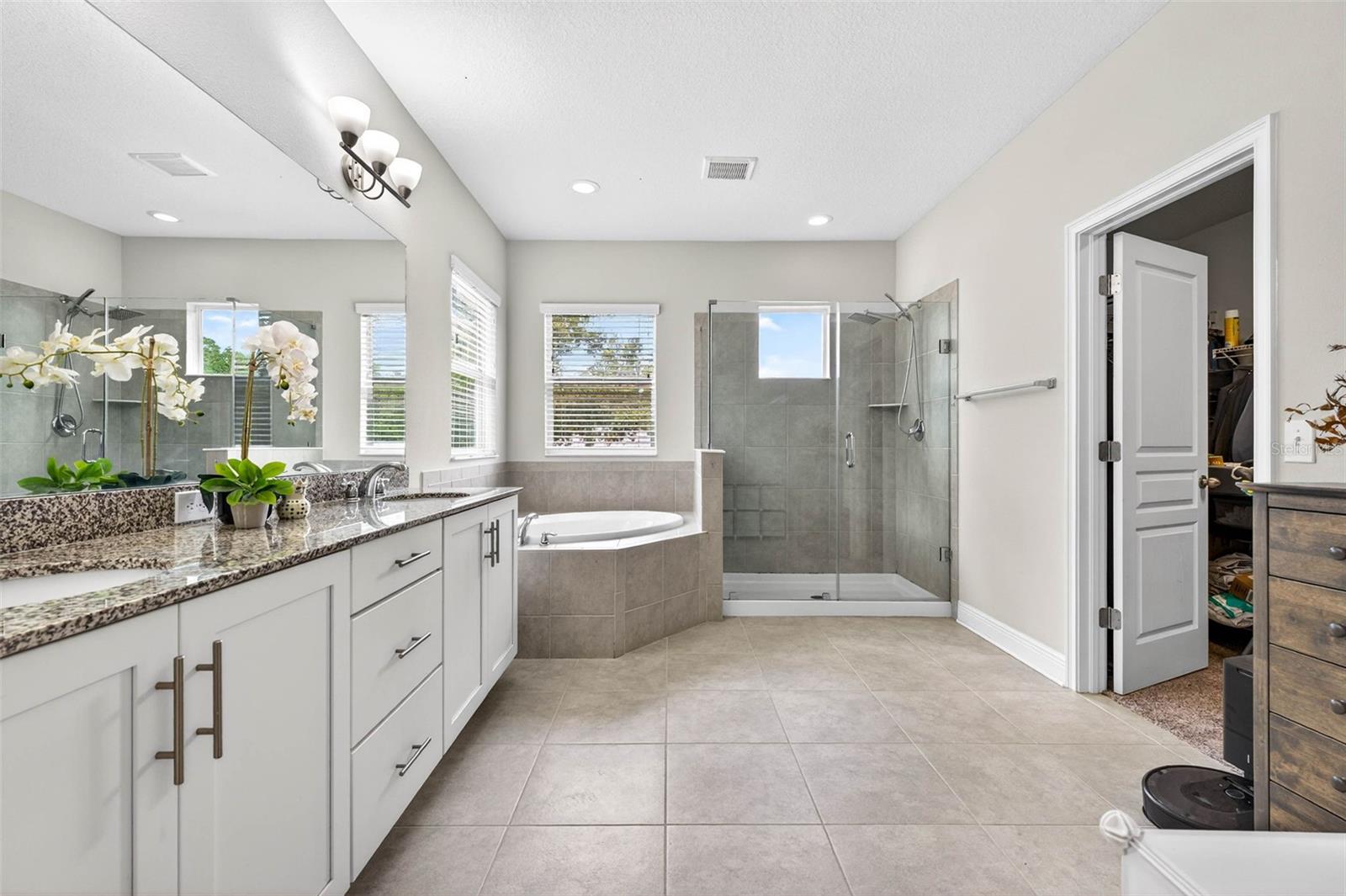 Primary Bathroom with separate tub and shower