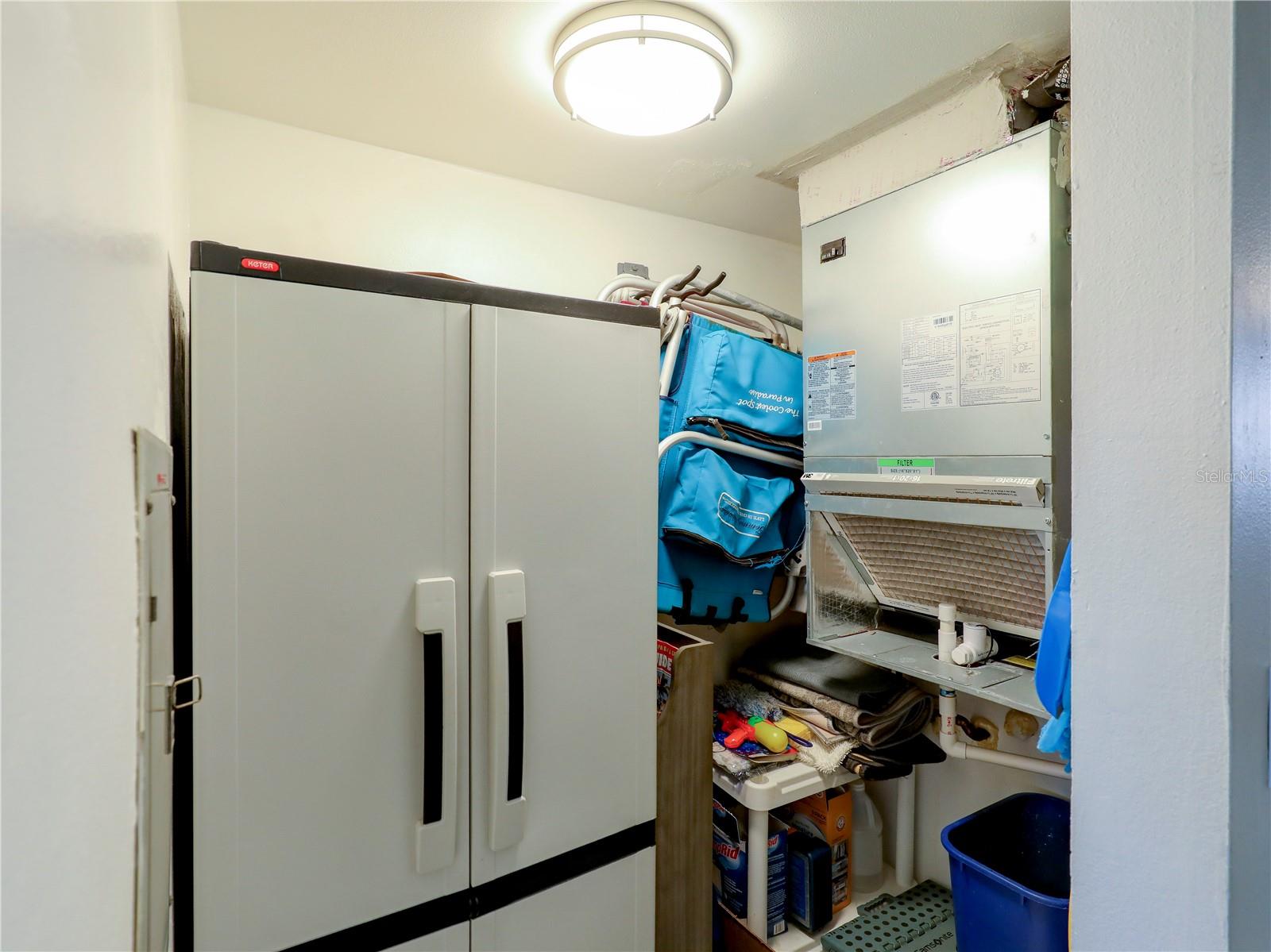 In unit storage with tankless water heater