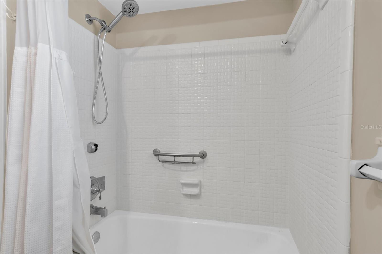 Main bathroom has a nice tub.