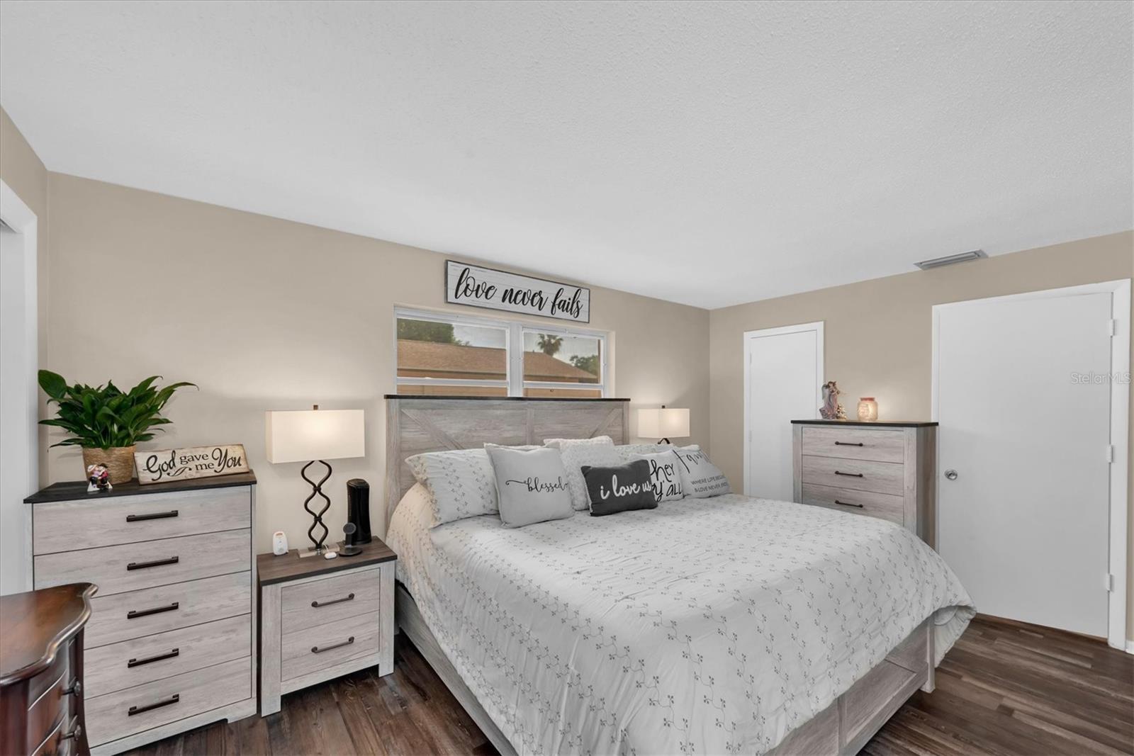 Another view of primary bedroom.