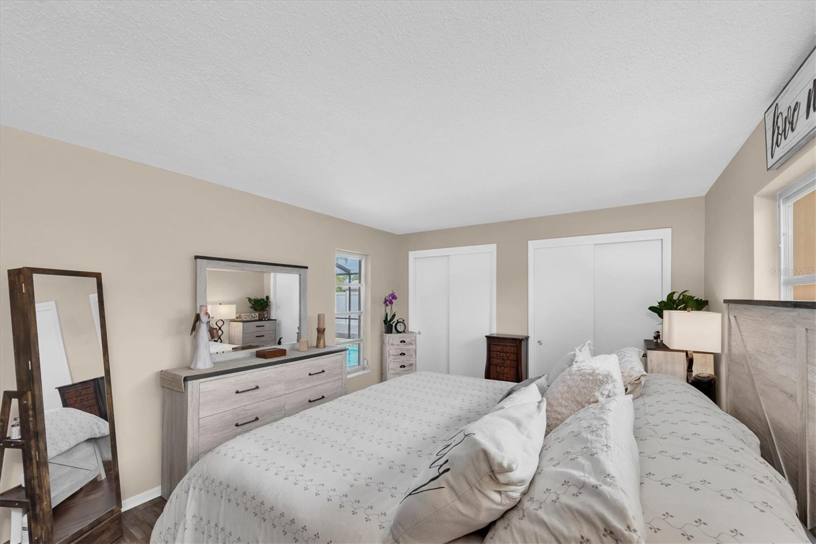 Primary bedroom has a pool view with an ensuite bathroom!