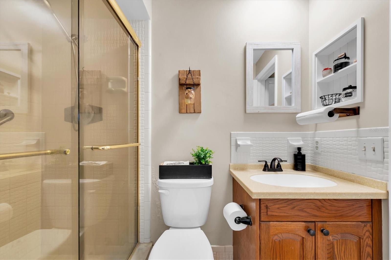 Primary bathroom with updated countertop and hardware!