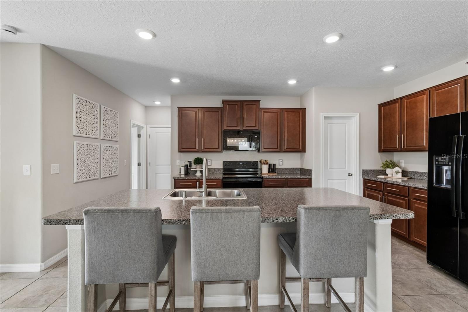 with a guest room right off the kitchen that is utilized currently as an office.