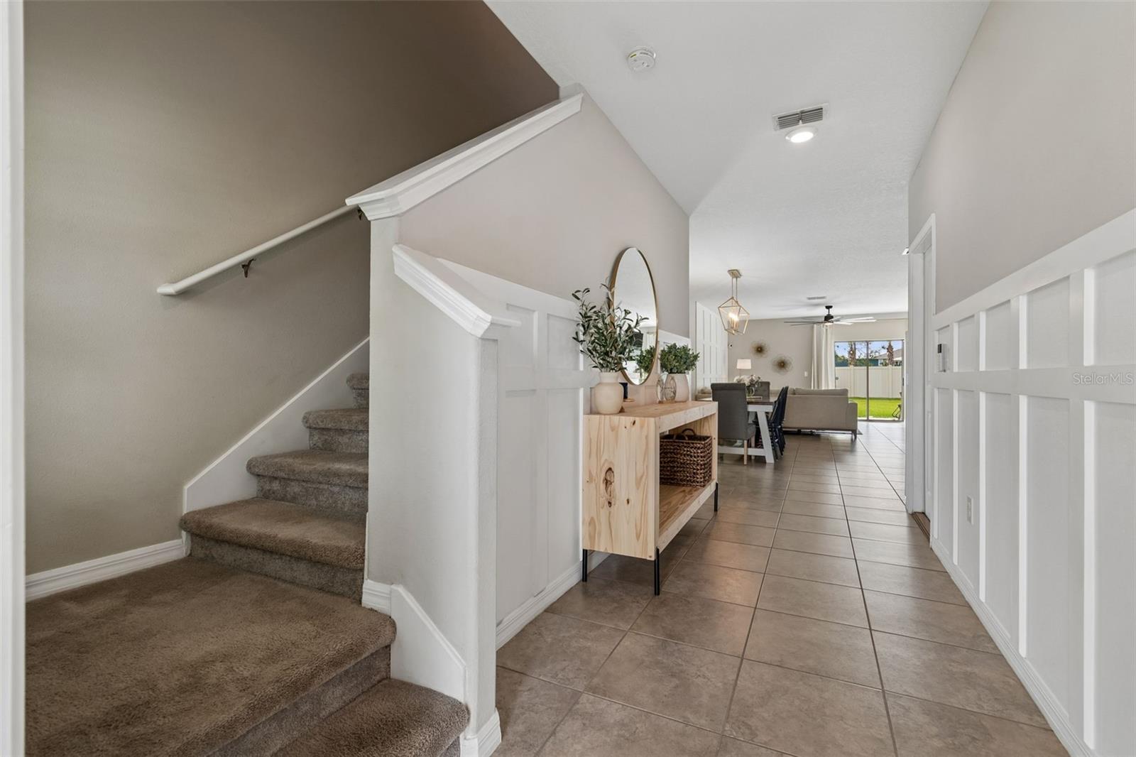 Enter to a beautiful view and quick ability to go right up stairs.