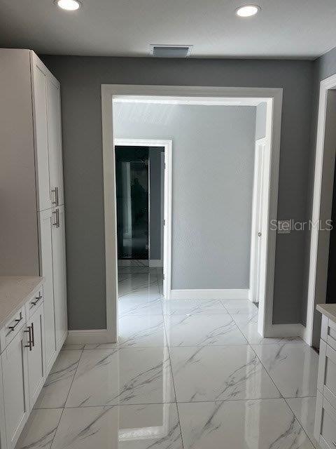 Kitchen facing bathroom/laundry