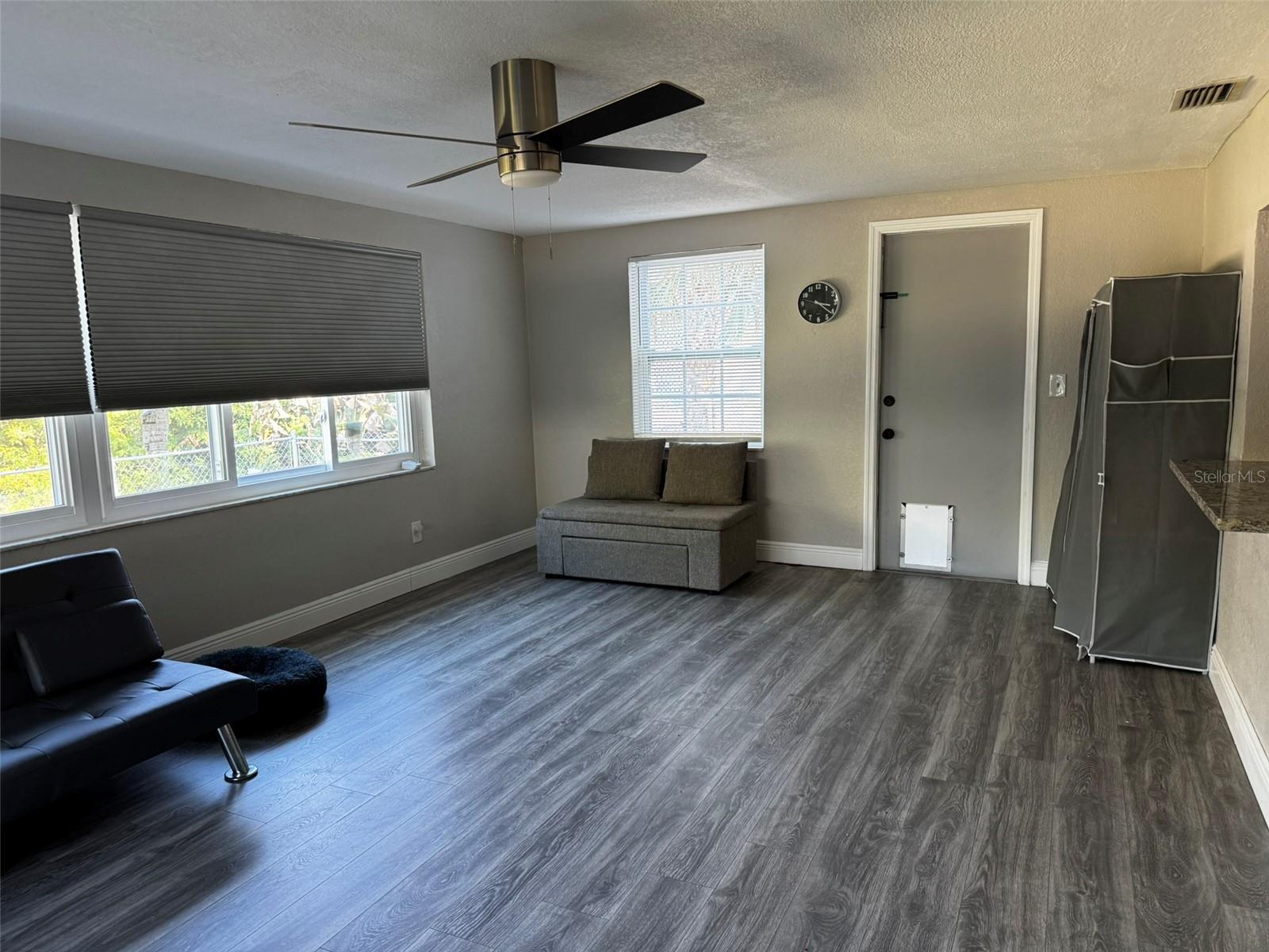 Spacious great room with back yard access