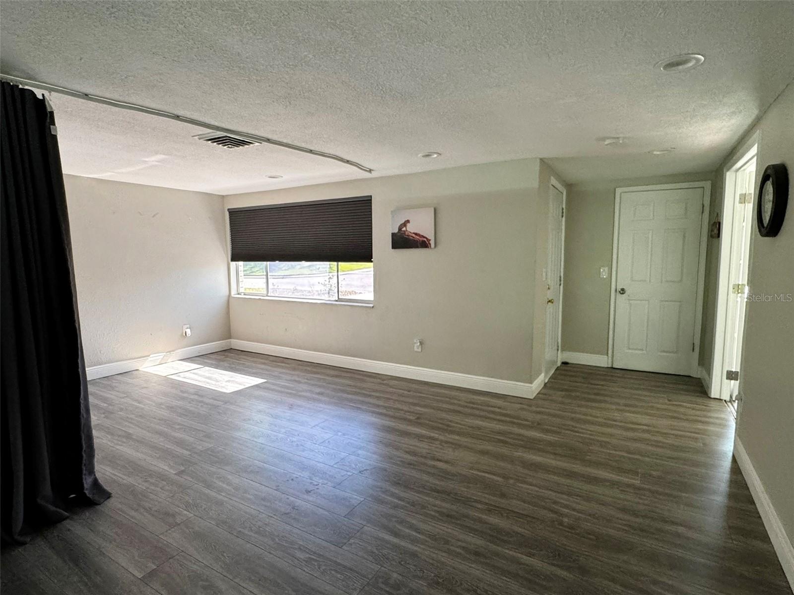 separate living, front door/foyer