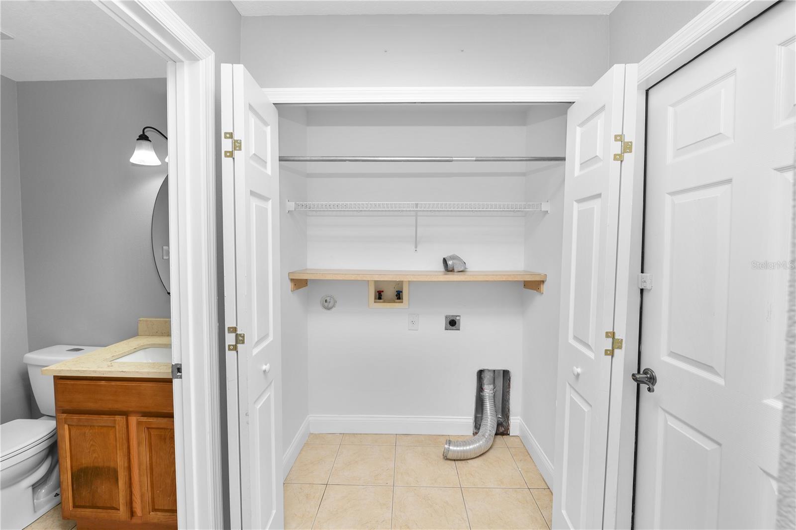 half bathroom and utility closet