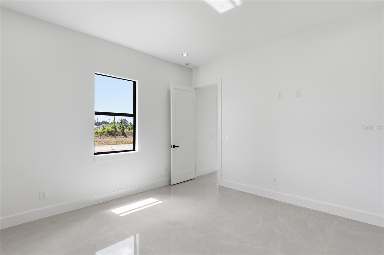 1124 S EDELWEISS ST E, LEHIGH ACRES, FL, 33974