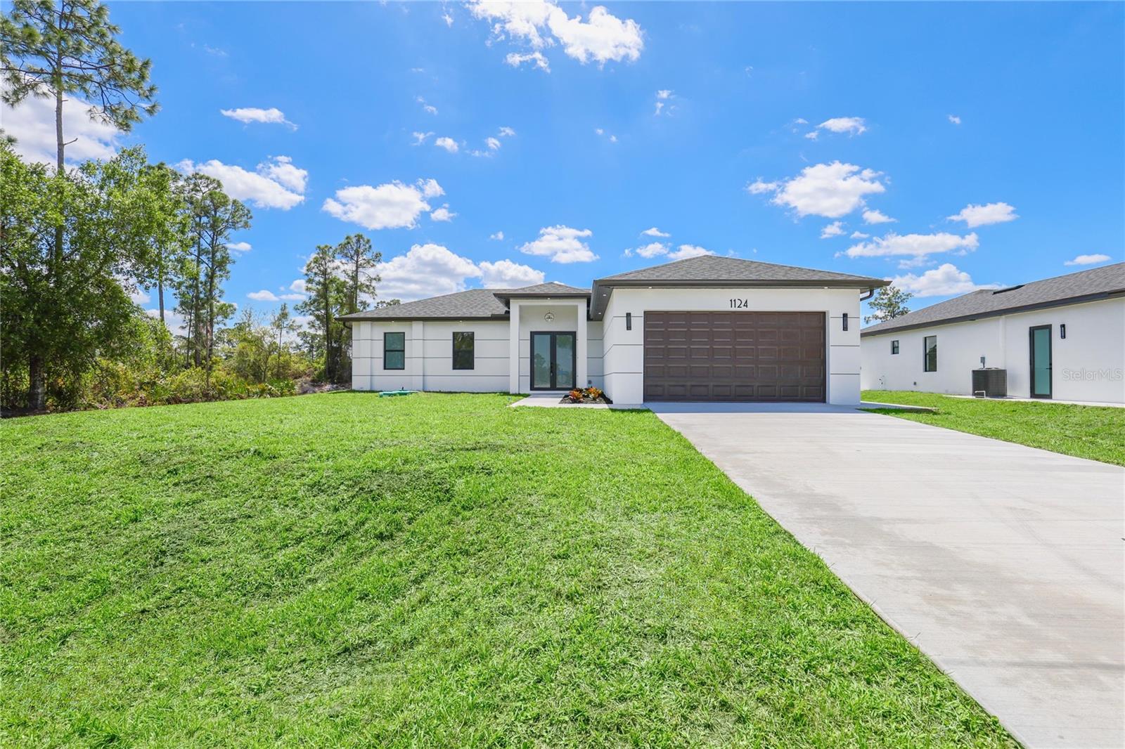 1124 S EDELWEISS ST E, LEHIGH ACRES, FL, 33974