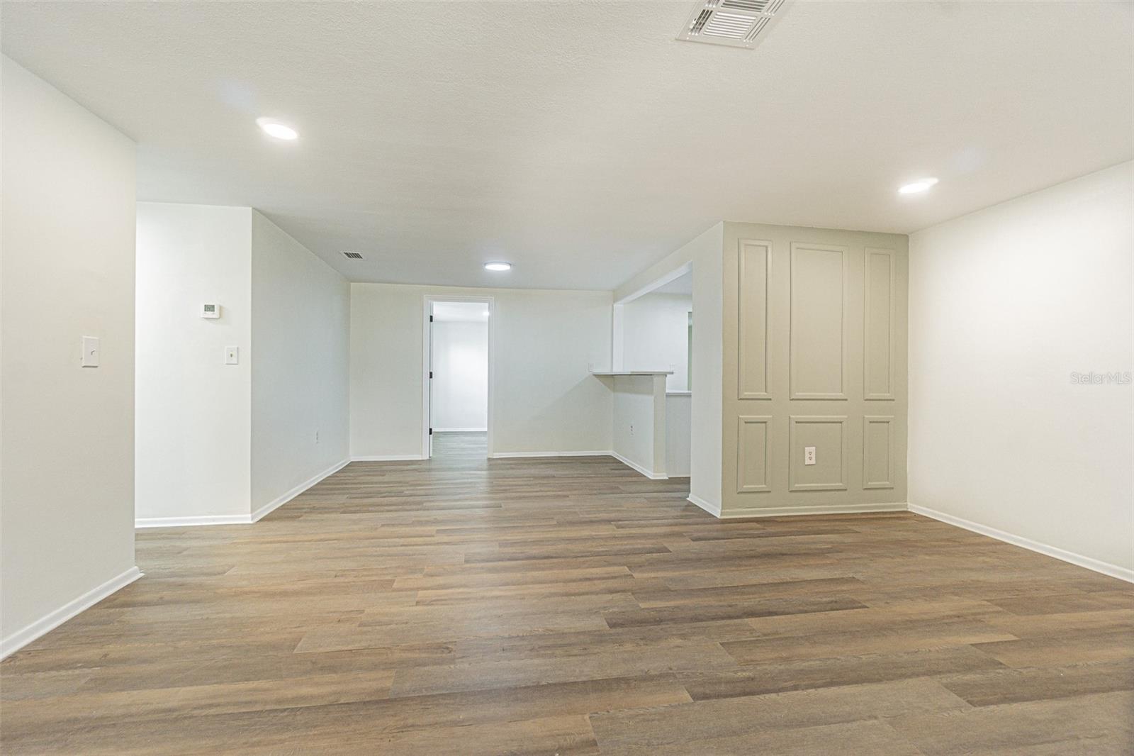 Living Room view to dining area and bedroom #3