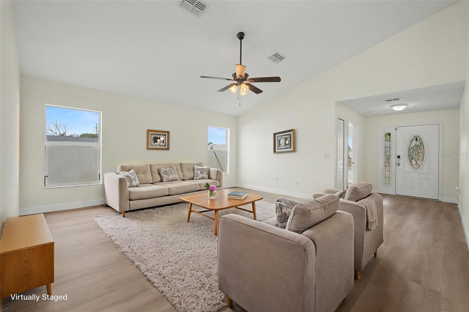 Virtually staged to show the potential for this spacious living room