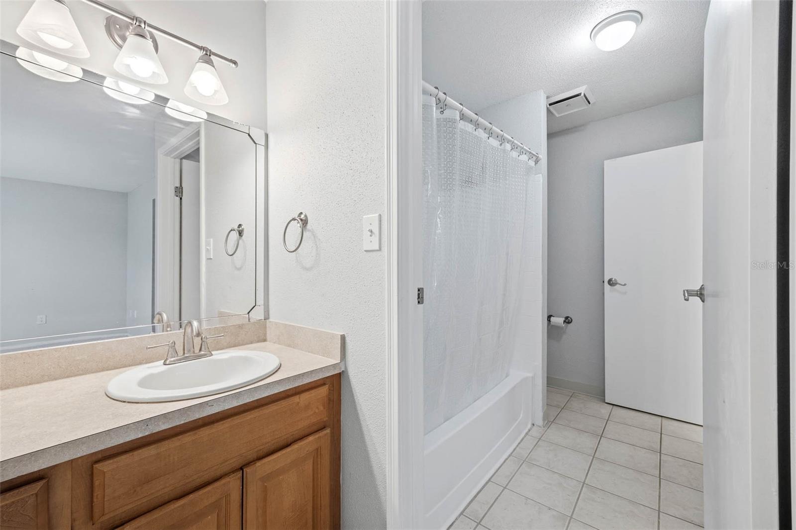 Primary Bedroom Vanity leading into Bathroom