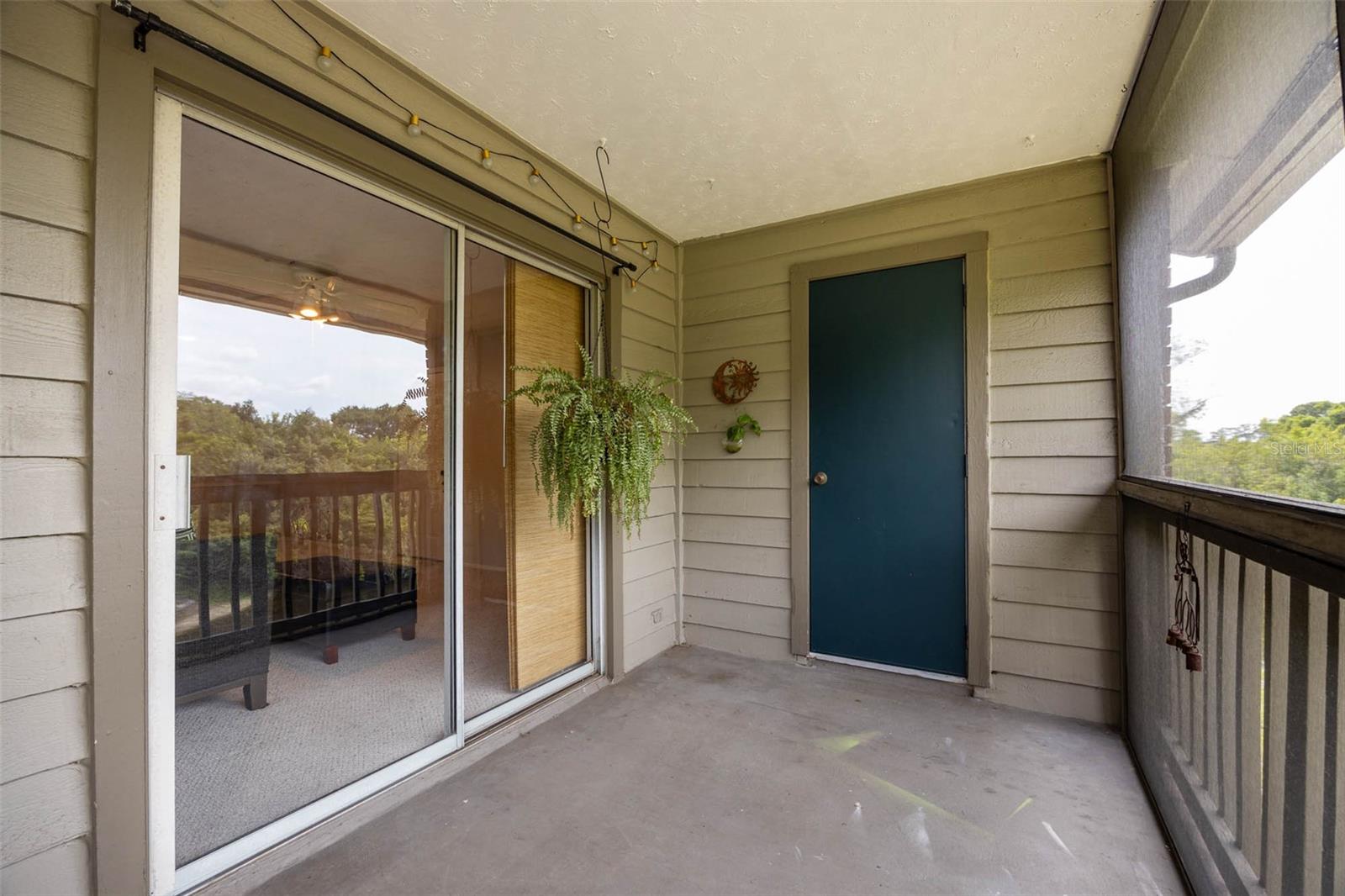 Screened Porch with storage closet