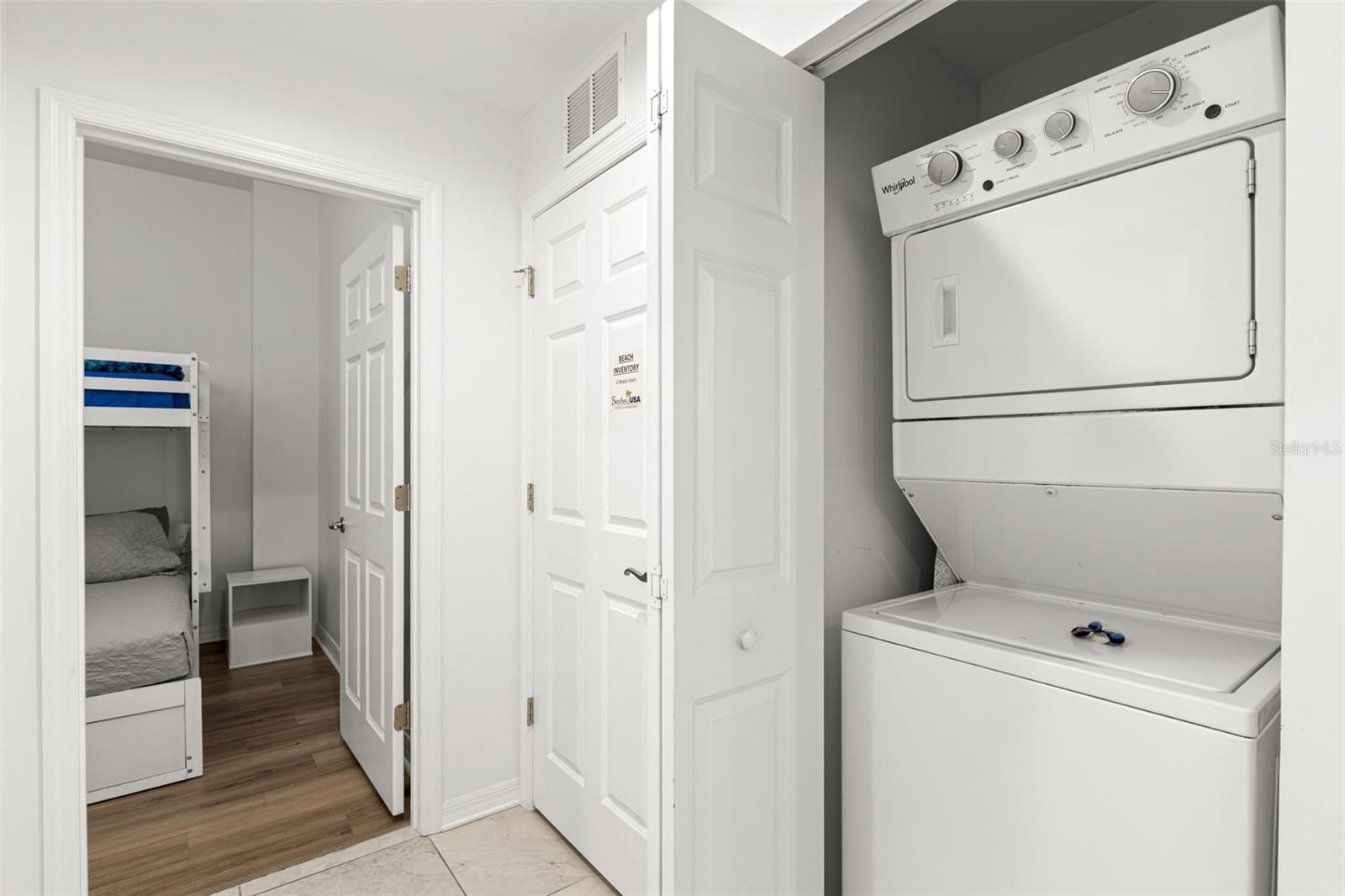 Owners closet, washer/dryer