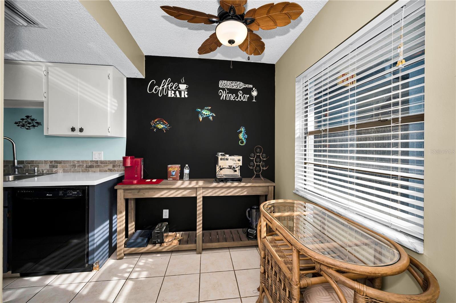 Casual dining zone off the kitchen with a view of the Gulf