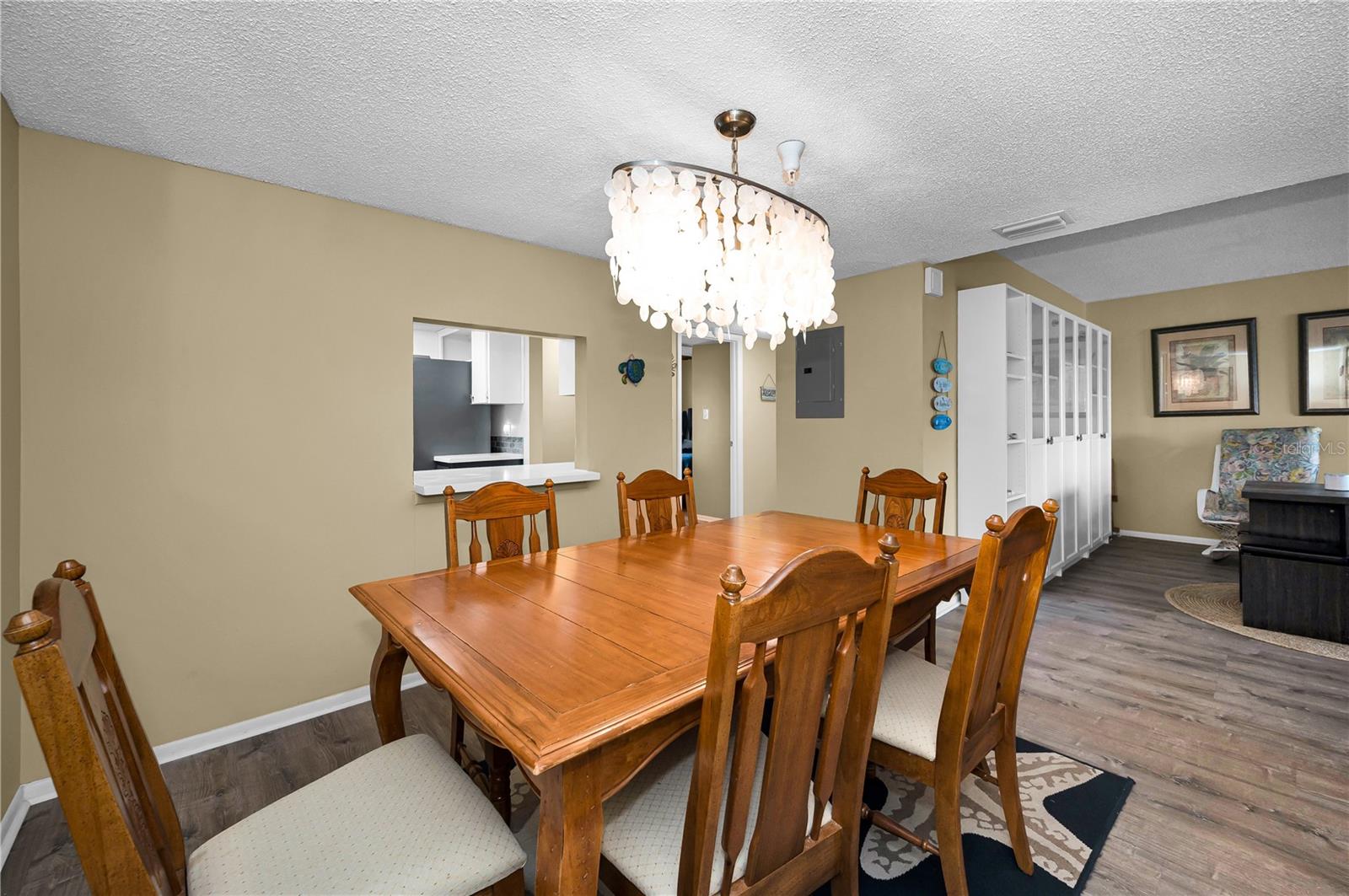 Formal Dining Room off the Kitchen and adjacent to the Living Room