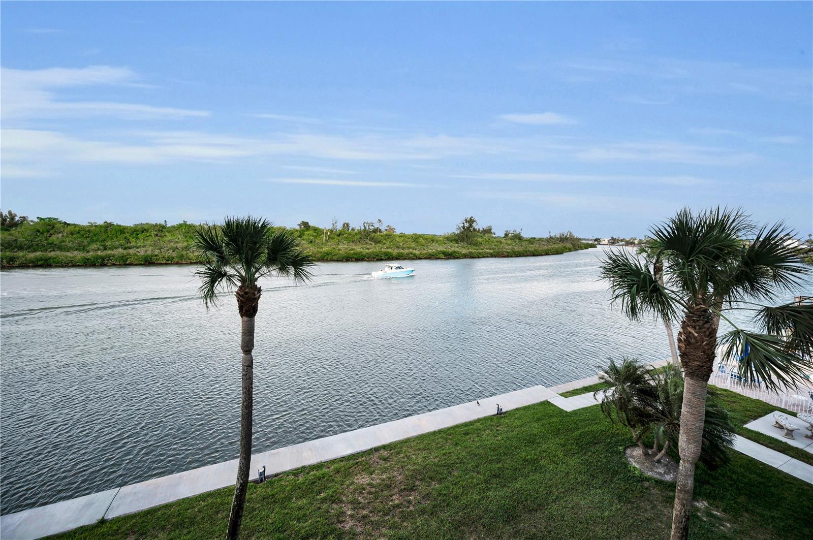 Enjoy quiet moments on the balcony overlooking the serene waterfront