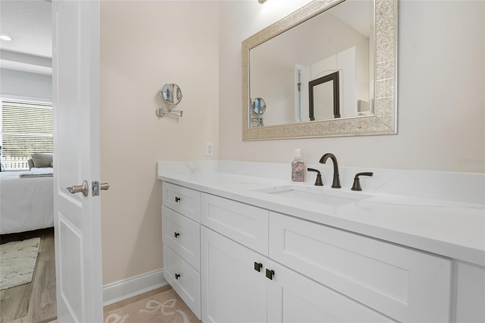 dual vanities and sinks and updated mirrors and faucets