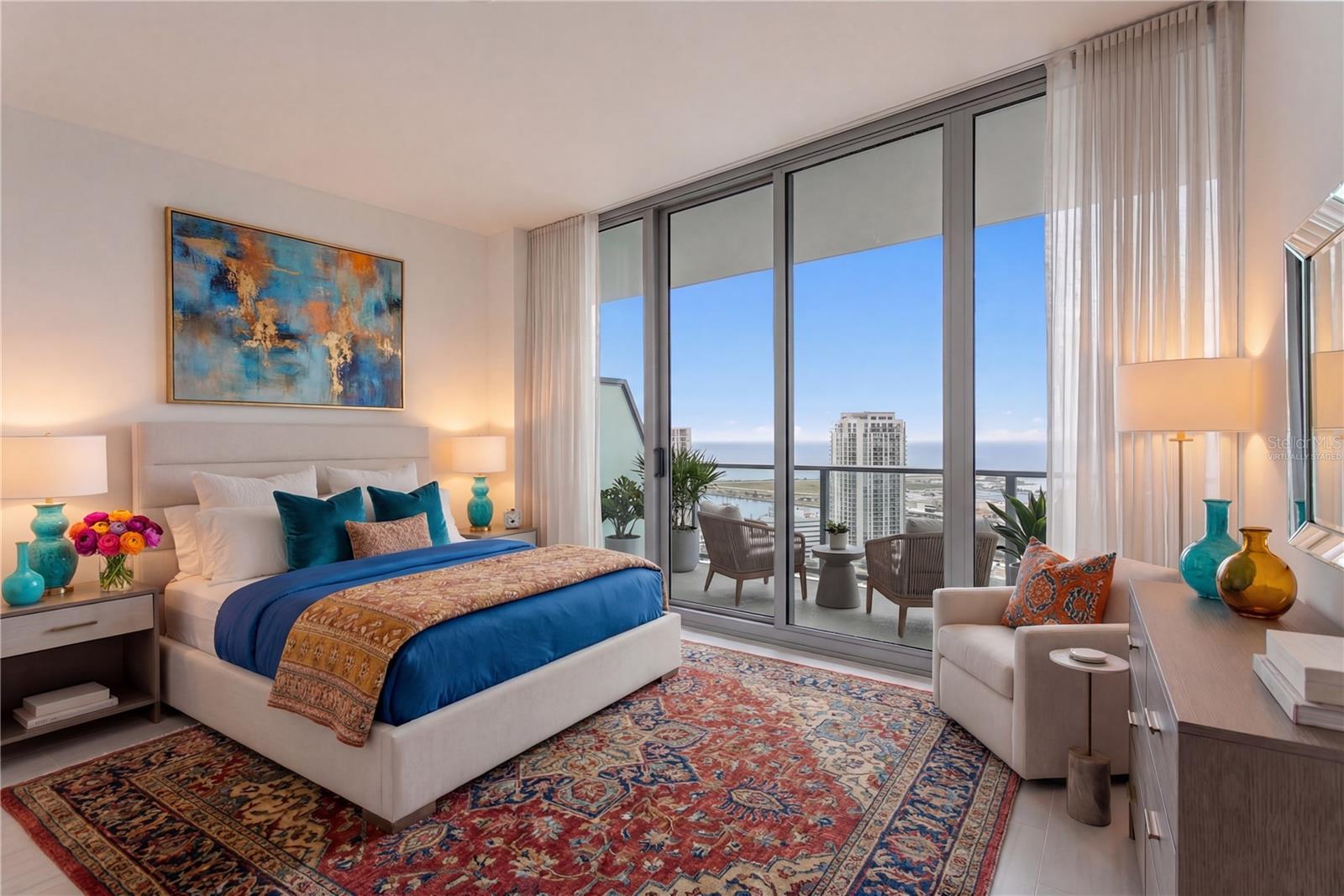 Virtually staged Primary Bedroom with City and Water Views!