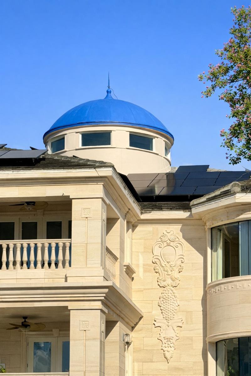 Signature blue dome crowns this Palace by the Sea architectural masterpiece.