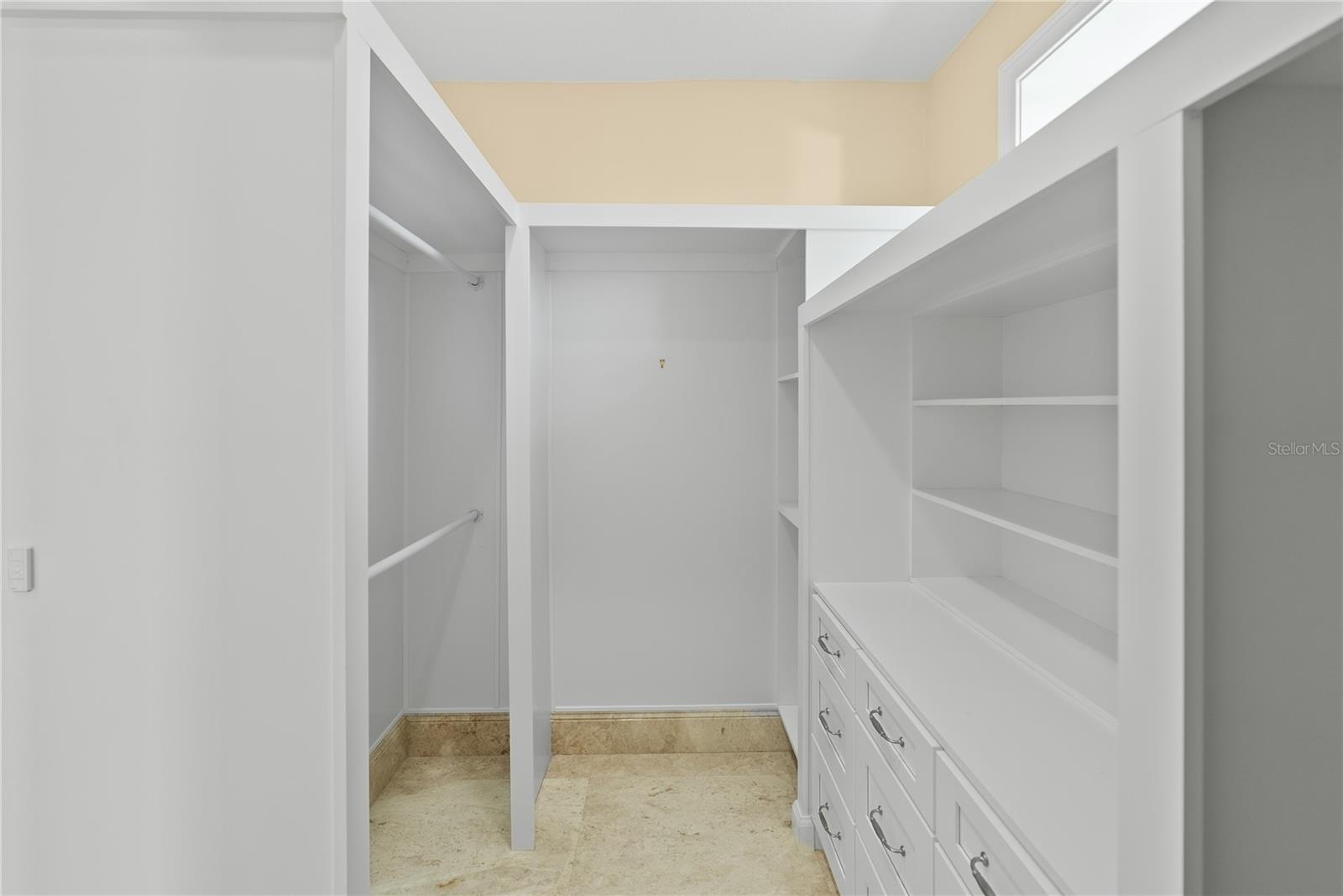 Immaculate custom closets with abundant storage, maintained in like-new condition.