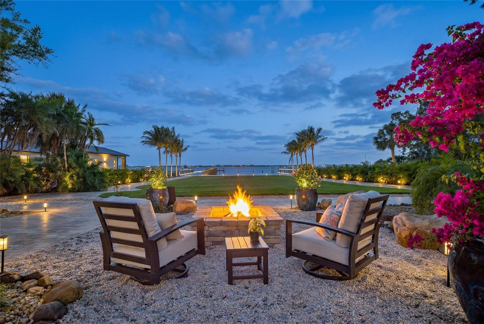 A cascade of blooming bougainvillea enhances the estate’s lush, tropical landscape.