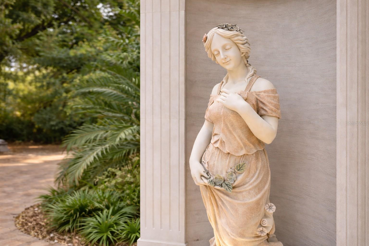 Imported marble statues throughout the grounds.
