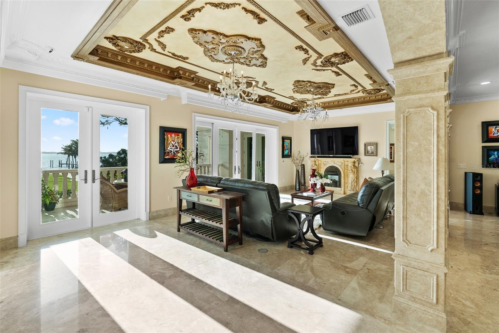 Expansive living spaces oriented to capture panoramic waterfront views.