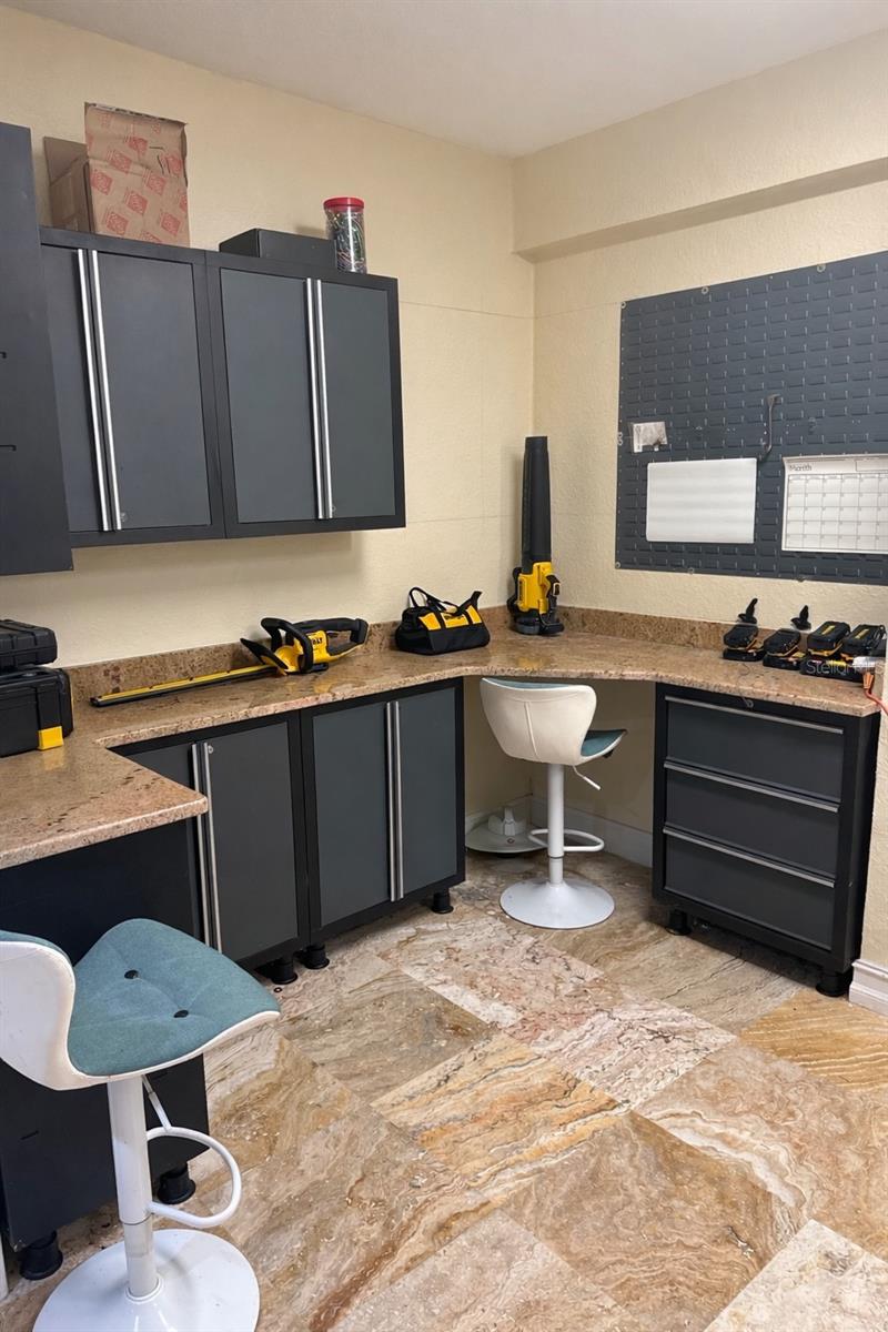 Workshop in garage plus storage.