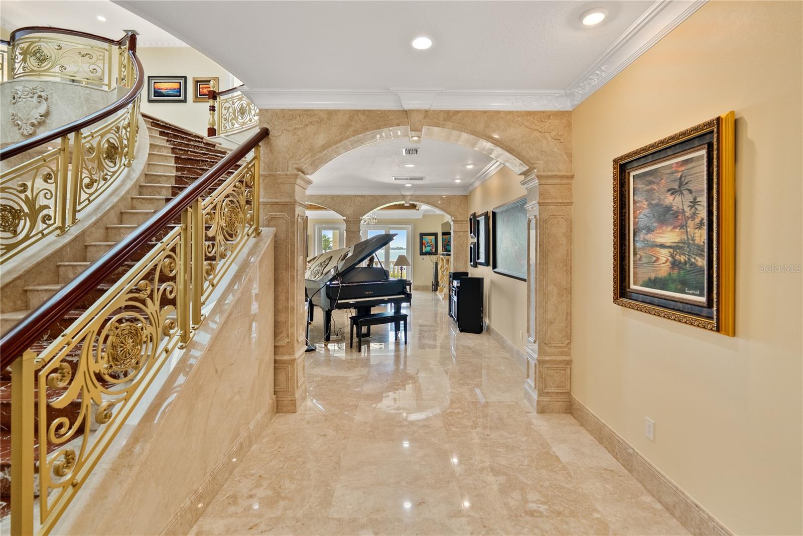 Gallery-style corridor ideal for art display, a grand piano, or entertaining.