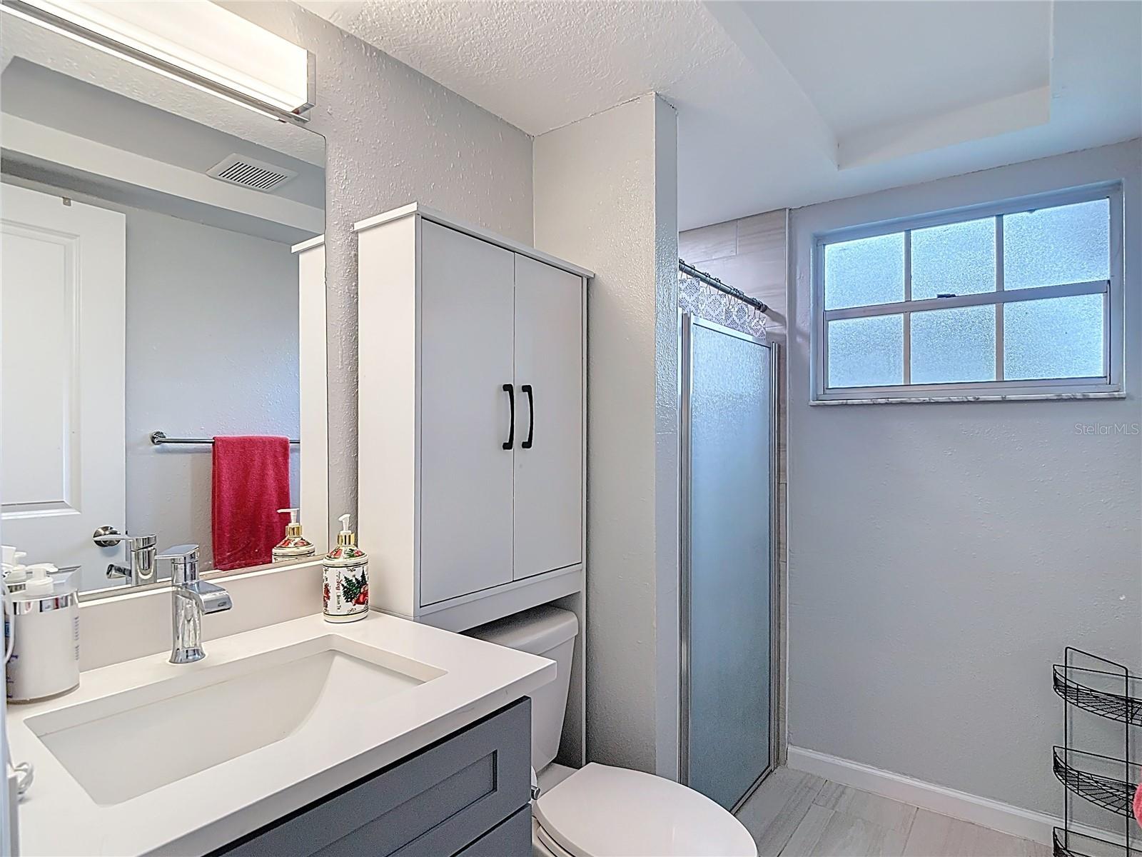 Primary bathroom with a walk in shower
