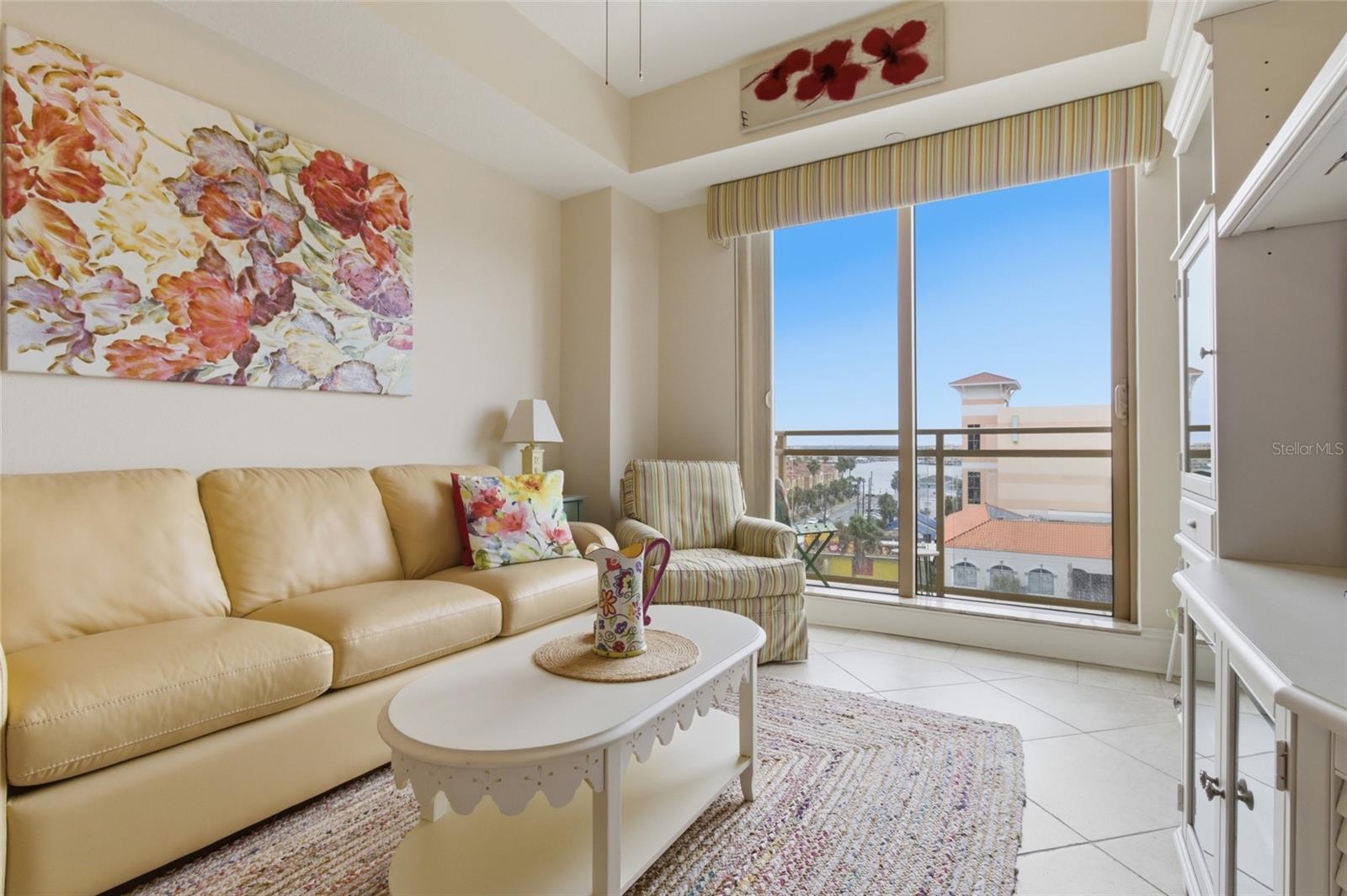 This space serves as a bedroom but could also be an office.