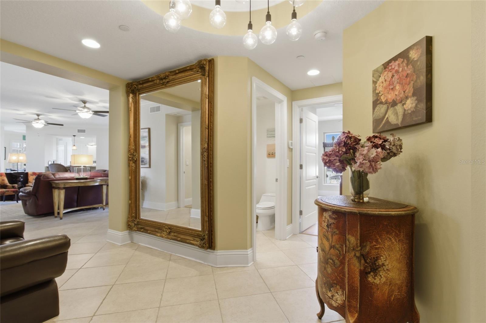 Spacious foyer and designer lighting.