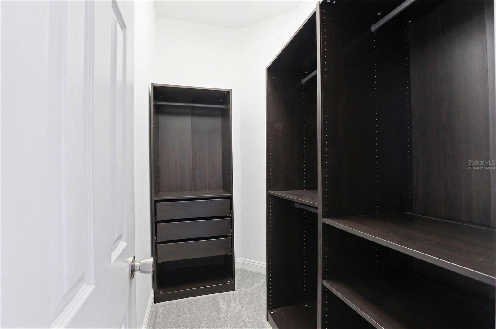 primary closet - virtually staged