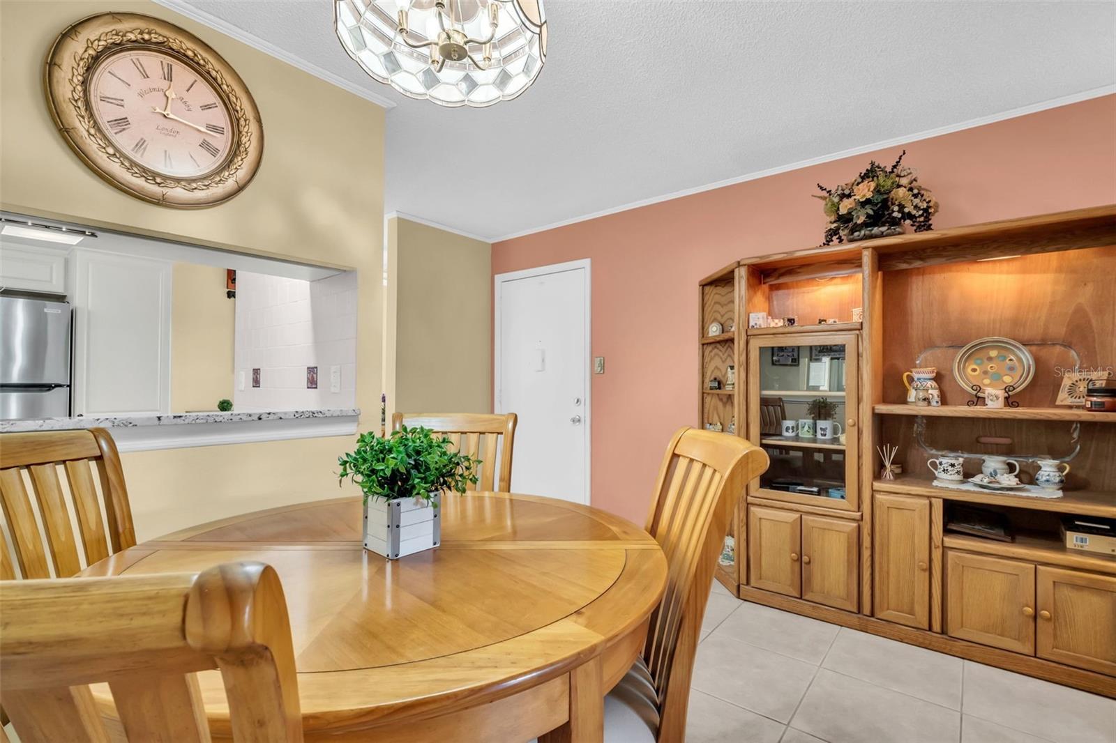 Dining room with convenient kitchen pass-through~