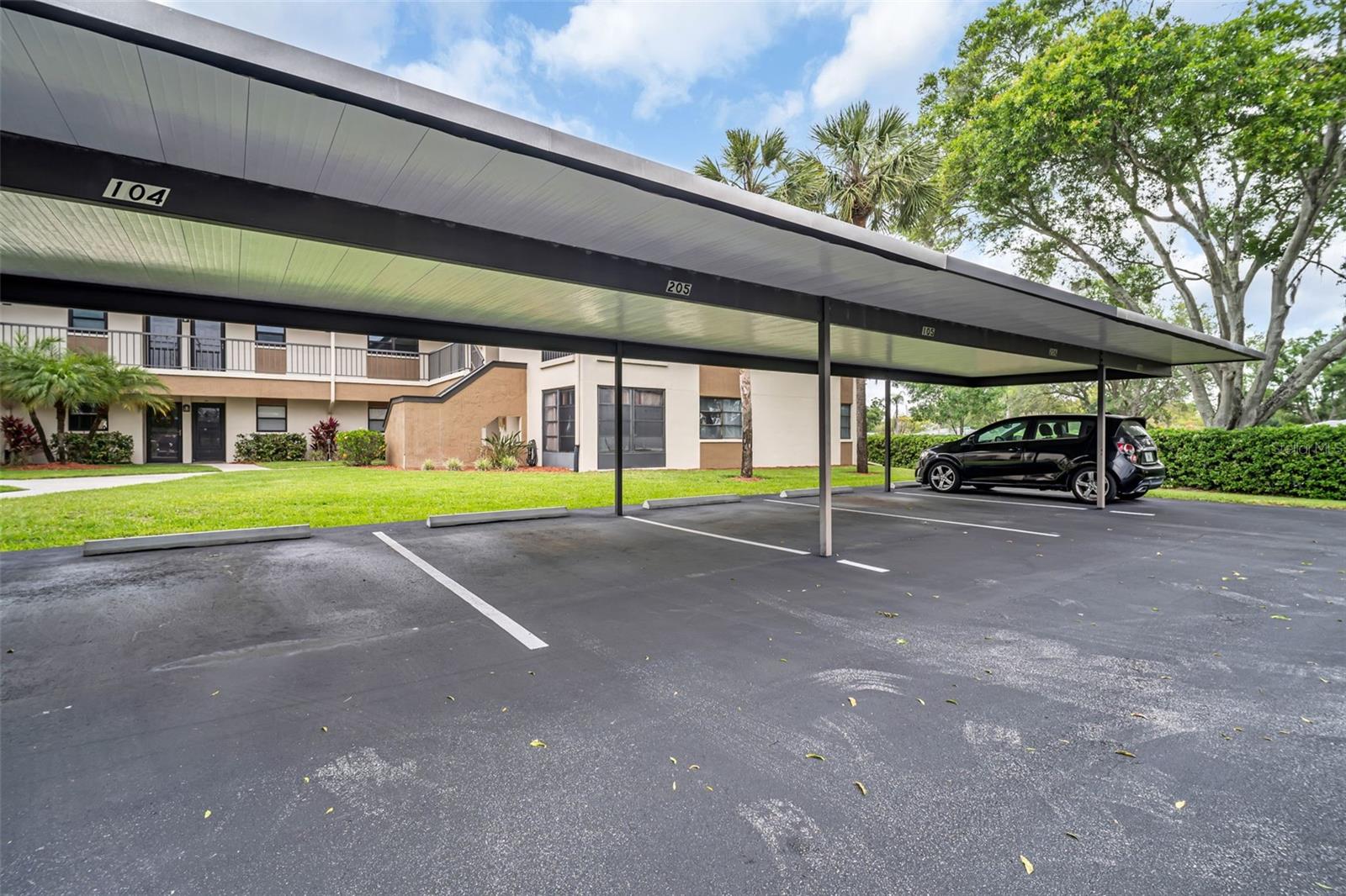 Reserved covered carport just steps from your front door~