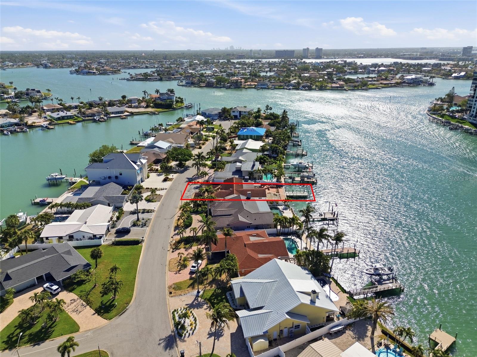 Drone shot looking east on tranquil Bellevue Drive with 4 Bellevue highlighted in "red".  Most homes have already been remediated or are in the process.  The street is a cul-de-sac with very little traffic other than neighbors.
