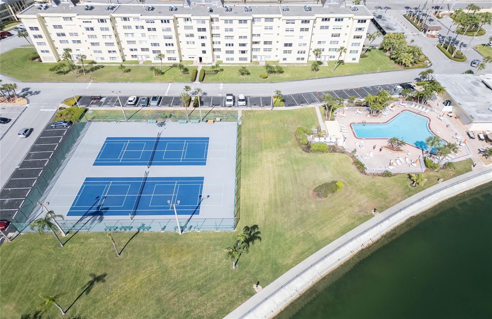 Tennis/pickleball courts, main pool, Entrance upper right, view facing East