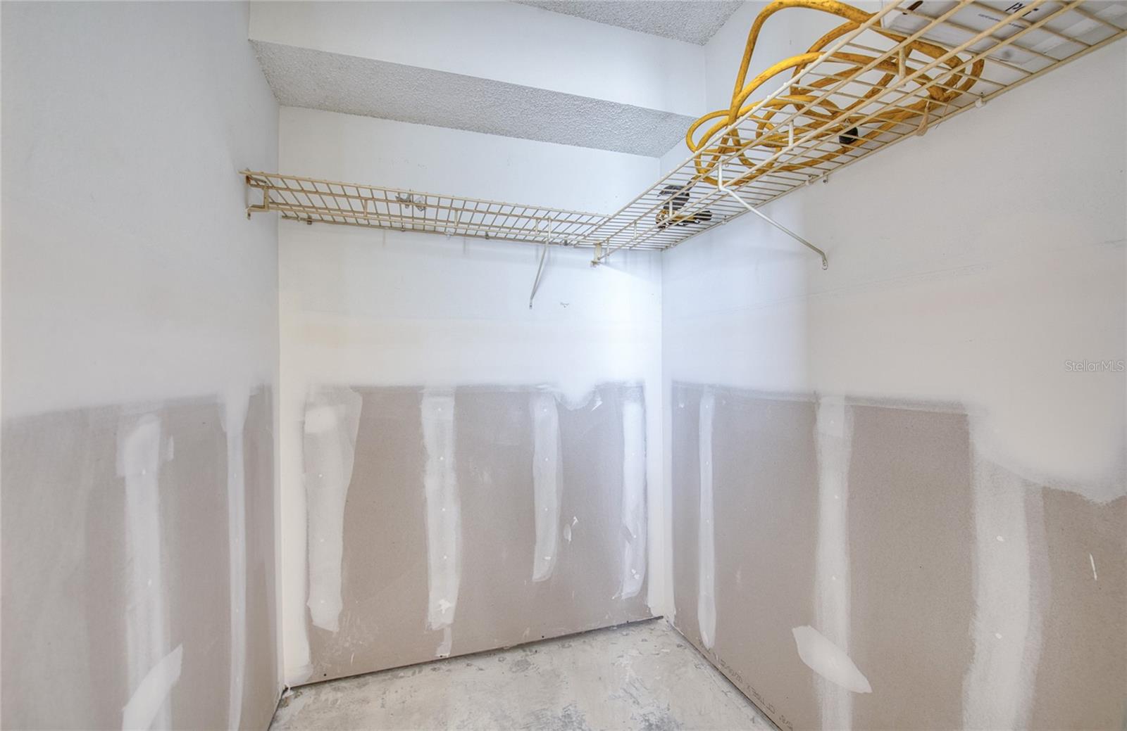 Primary bedroom, walk-in closet