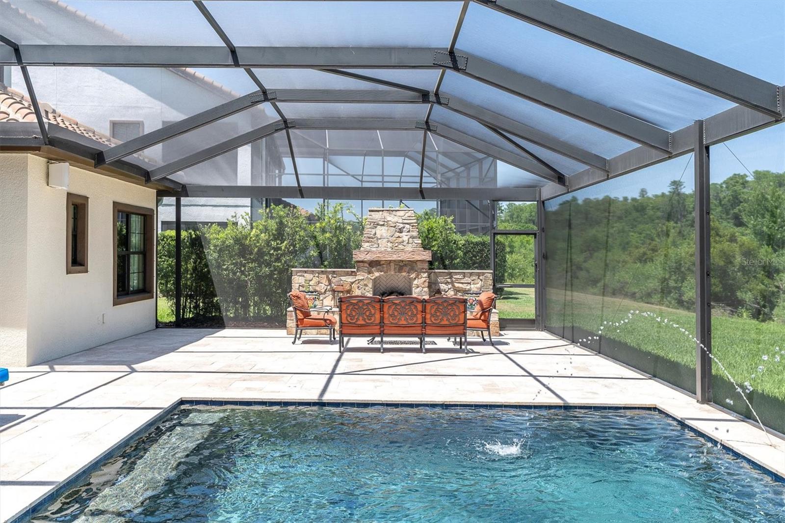 CUSTOM STONE OUTDOOR FIREPLACE~ THE ULTIMATE FLORIDA OUTDOOR LIFESTYLE