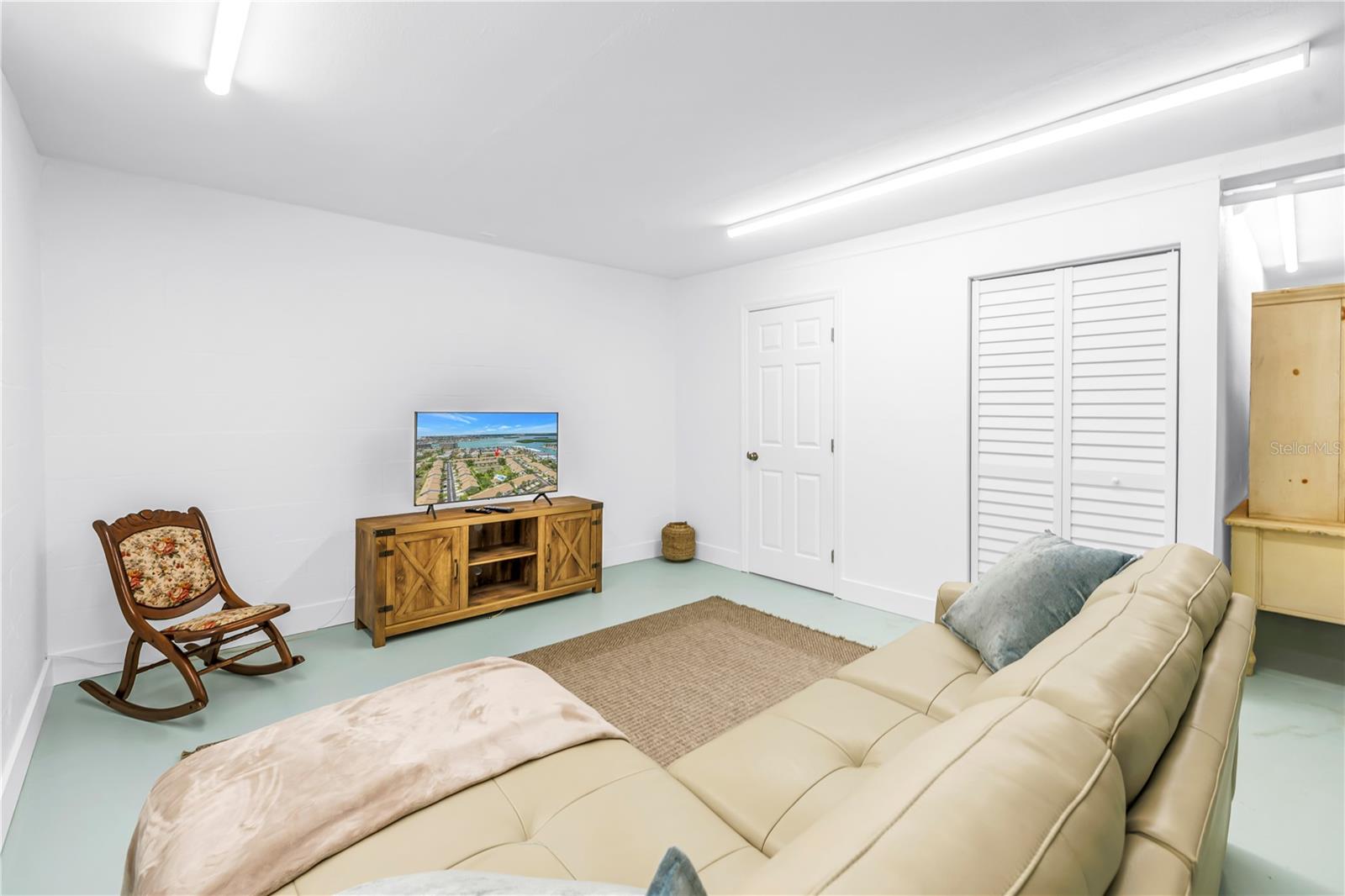 Bonus room in garage with bathroom and large storage closet