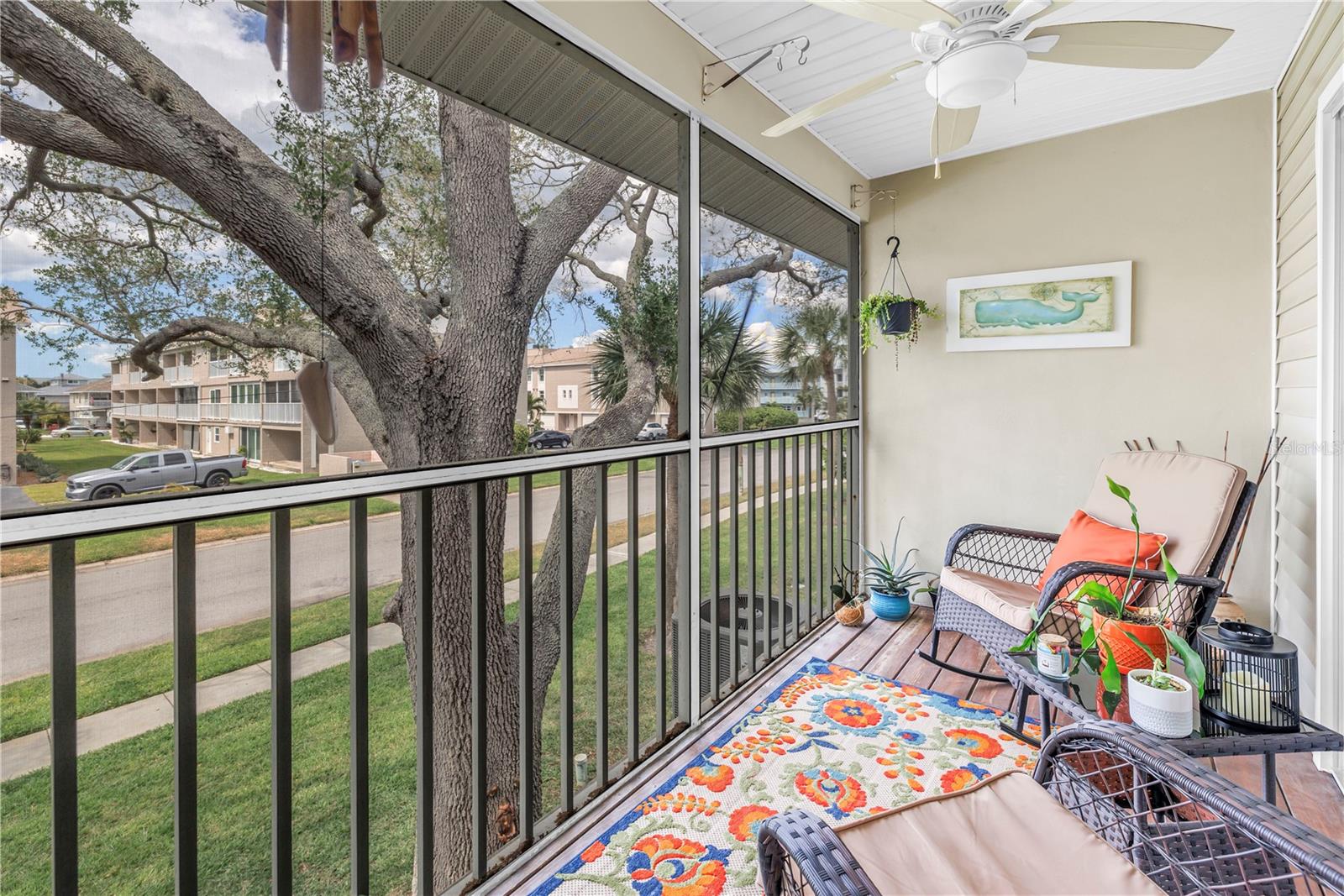 Enclosed screened  balcony on second floor off of Living room