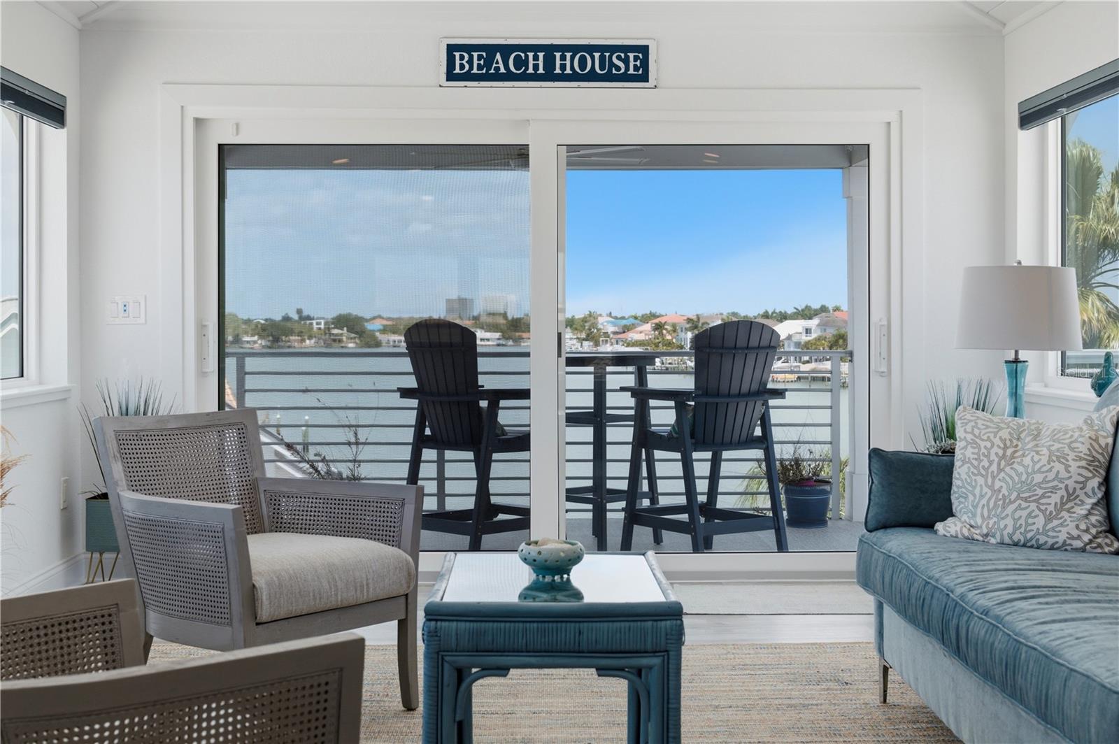 Top floor living area with wet bar and panoramic views a perfect place to relax and unwind.