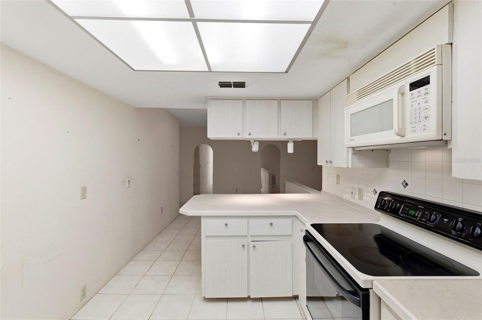 View of the kitchen looking to the dining room.