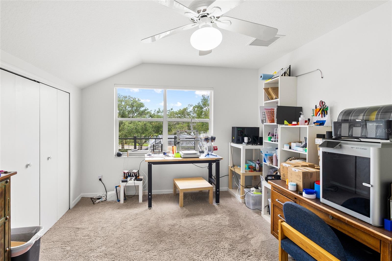 Bedroom #4, currently being used as a 3-D printer manufacturing site