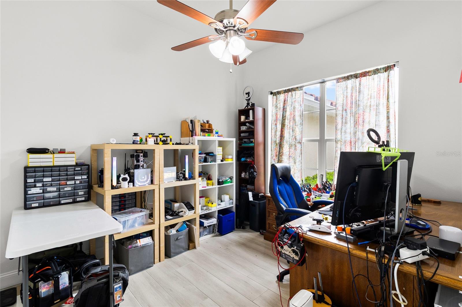 Den/fifth bedroom has easy access to front door and has a full closet.