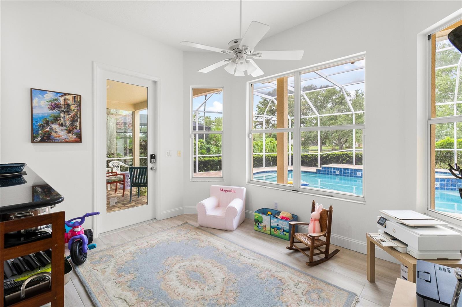 Breakfast room currently being used as a playroom.  Separate access to pool area.